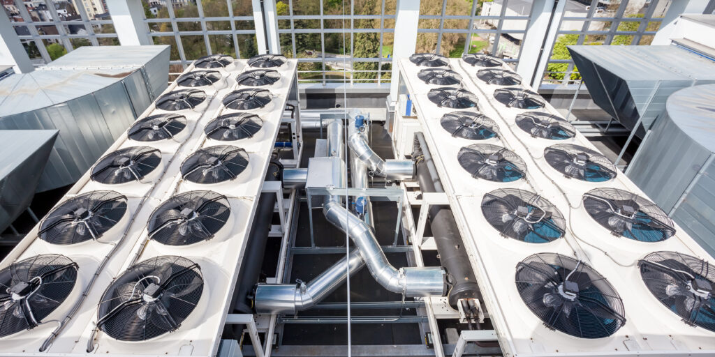 a large room filled with lots of air conditioners